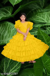 Indian net ruffle dress with embroidery and beads, perfect for festive occasions. Sizes available from 5-16 years