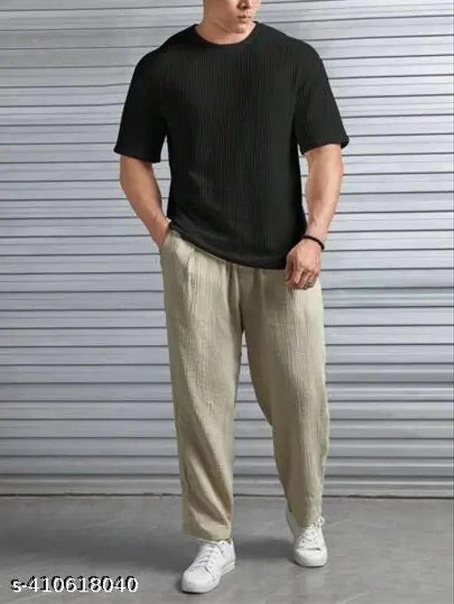Men's cotton blend oversized dropshoulder T-shirt, solid round neck, short sleeves - perfect for casual outfits and everyday wear. Available in various colors and sizes, made with premium materials for comfort and durability, India origin