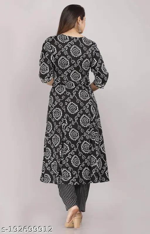 Women's rayon printed Anarkali kurti with palazzo set, three-quarter sleeves, colorful pattern, Indian ethnic wear on mannequin