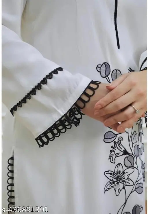 White rayon kurta pant set with long sleeves, printed net pattern on display