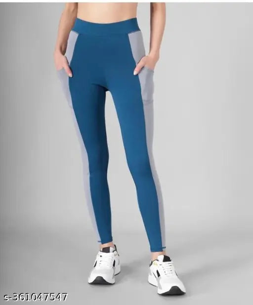 Peach polyester-spandex striped jeggings for women's gym wear, stretchable and breathable for yoga and workouts