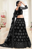 Semi-stitched women's net lehenga choli and dupatta, embroidered with intricate Indian patterns, size 42/44