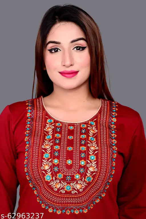 Woolen winter kurti with embroidered design, three-quarter sleeves, and multi-color pattern. Sizes: S (40in bust, 42in length), L (42in bust, 42in length), XL (44in bust, 42in length), XXL (Indian sizes). Fashionable for regular use and parties. Origin: India