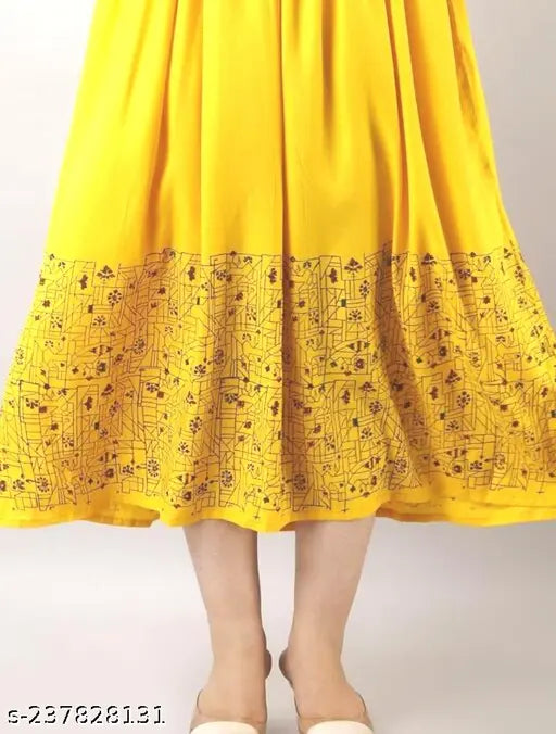 Yellow printed rayon flared kurta, three-quarter sleeves, Indian traditional women's fashion on mannequin