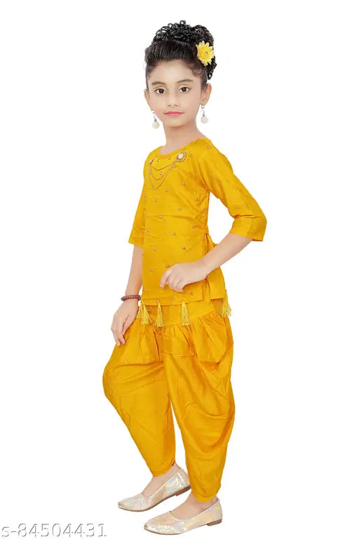 Embellished rayon kurti and dhoti set for girls, Indian party wear on display