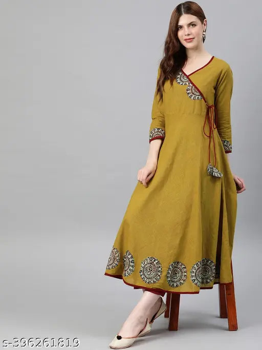 Yellow solid surplice cotton blend kurta, three-quarter sleeves, Yash Gallery