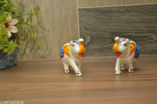 Handcrafted white and red elephant figurines set, paper mache decor for home or office, ideal gift for special occasions