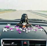 Black resin Adiyogi Shiva dashboard figurine. Crescent moon top, ideal spiritual gift." (91 characters)