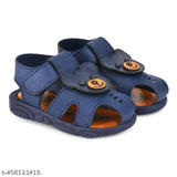 Stylish synthetic jungle-themed kids shoes, ideal for boys ages 9-12 months. Solid net design with Velcro fastening. Made in India