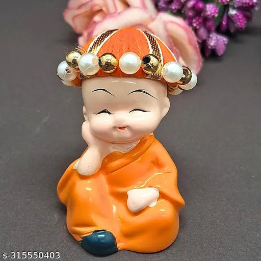 Multicolored polyresin baby Buddha monk idols (4 pieces), handcrafted Indian decor for home, office & car