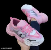 White Mento Wogdan sneakers for women and girls, featuring EVA and canvas materials, with lace-up fastening and a colorblocked pattern. Comfortable for everyday wear, available in various sizes from India