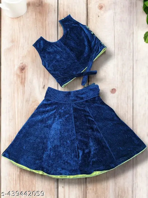 Zari embroidered mirror work velvet lehenga choli for girls, Indian party wear with sleeveless flared silhouette