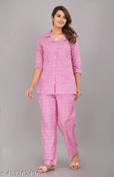 Pink cotton printed women's night suit set, loose-fitting pyjamas with 3/4 sleeves, floral print on breathable fabric, made by Pragya Textile