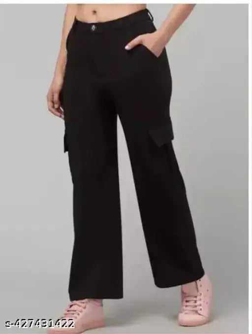 Black women's premium cotton wide-leg cargo trousers with insert pockets, solid black relaxed fit cargos on model