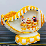 Marble handicraft Vignu showpiece, ornate idol of Lord Jagannath, Balabhadra, and Devi Shubhadra. Measures 14cm(L) x 11cm(H) x 1cm(B). Handcrafted artwork from India