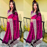Georgette purple embroidered Bollywood style saree with silk blend blouse, intricate Zari woven pattern on display