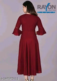Maroon rayon round neck kurti for women, casual & festive wear under 300 Rs. Solid design with three-quarter sleeves