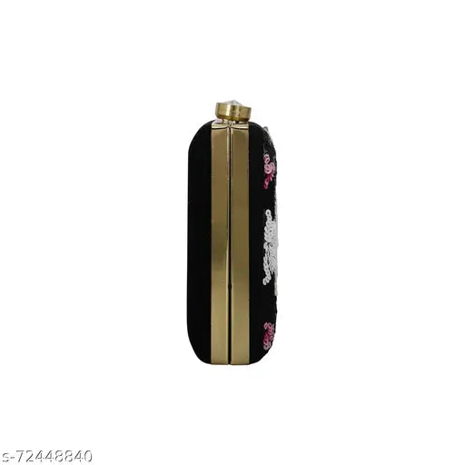 Handcrafted black velvet clutch, embellished net pattern, Indian Zari embroidery on display