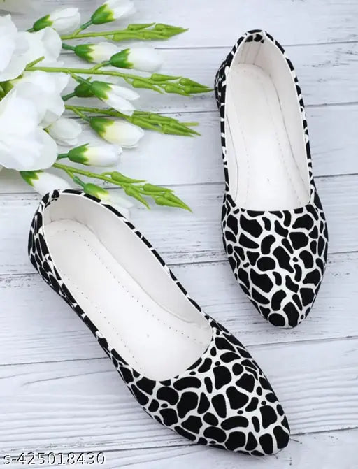 Modern Bellies: synthetic mules, closed back, solid pattern, available in sizes IND-4 to IND-9. Indian origin