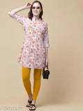 Pink rayon floral top and tunic with 3/4 sleeves, printed net pattern, and mandarin collar with waist belt