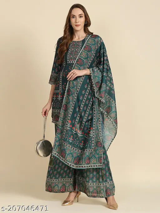 Kora Muslin printed Kurta Sharara Set with Chanderi Silk bottomwear, embroidered with chrochit work. Ideal for parties and festivals, available in sizes S-XXL. Indian ethnic wear for women and girls