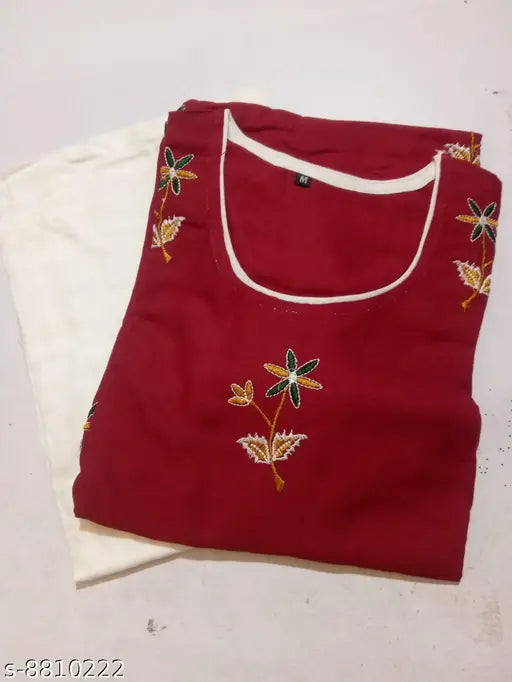 Embroidered rayon kurta with palazzos - vibrant Indian attire, three-quarter sleeves, embroidered net design