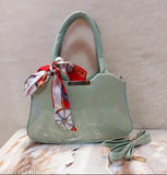 Synthetic marble print sling bag with handheld handle & strap, fashionable accessory for women & girls