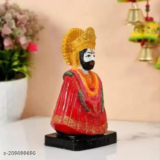 Handcrafted poly resin Shyam Ji figurine, intricately detailed with crescent moon and tilak. Used for car dashboards, home pujaghar, office puja corners, and gift giving occasions. Dimensions: 10cm (L) x 0.5cm (H) x 0.5cm (W). Indian origin