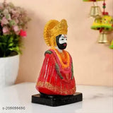 Handcrafted poly resin Shyam Ji figurine, intricately detailed with crescent moon and tilak. Used for car dashboards, home pujaghar, office puja corners, and gift giving occasions. Dimensions: 10cm (L) x 0.5cm (H) x 0.5cm (W). Indian origin