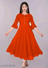 Red rayon straight kurta for women, three-quarter sleeves, solid pattern. Woman wearing red kurta with ball-shaped sleeves
