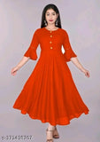 Red rayon straight kurta for women, three-quarter sleeves, solid pattern. Woman wearing red kurta with ball-shaped sleeves