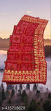 Green georgette Bandhani saree, intricate print design on display