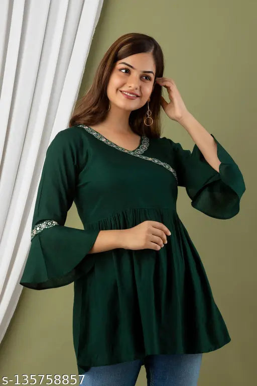 Dark green rayon bell sleeve top with embroidered net detail, ideal for women's casual wear