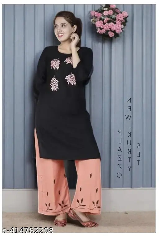 Black rayon kurta with palazzos, embroidered net, three-quarter sleeves - premium quality women's fashion from Simba