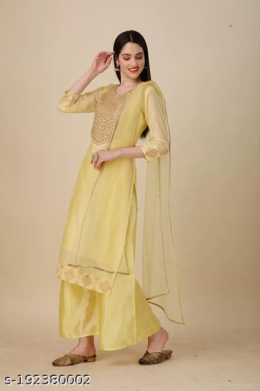 Yellow Chanderi Cotton Kurta Set with Palazzo and Dupatta, embellished with sequins and lace, perfect for party wear in India