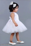 White star net fancy frock, embellished with pearls on a sleeveless, single size dress for 6-12 months, country of origin: India