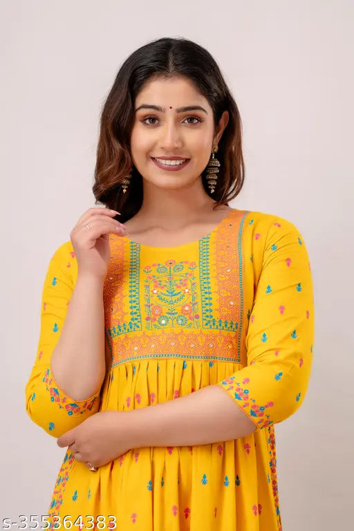 Yellow rayon kurti with side slits, ideal for haldi ceremony and festive wear