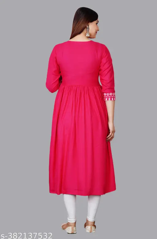 Trendy pink rayon Anarkali Kurta with three-quarter sleeves, vibrant design, suitable for women's traditional wear