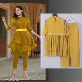 Georgette Kurta set with palazzos, solid net pattern, three-quarter sleeves. Indian fashion on display