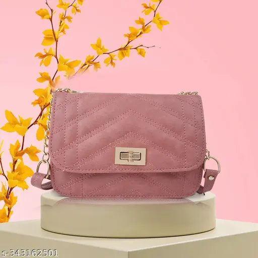 Faux leather gold chain slingbag, versatile women's accessory for daily use. Solid design, 1 compartment, free size (L10in x W2in x H6in). Handcrafted by FOMMIL, India