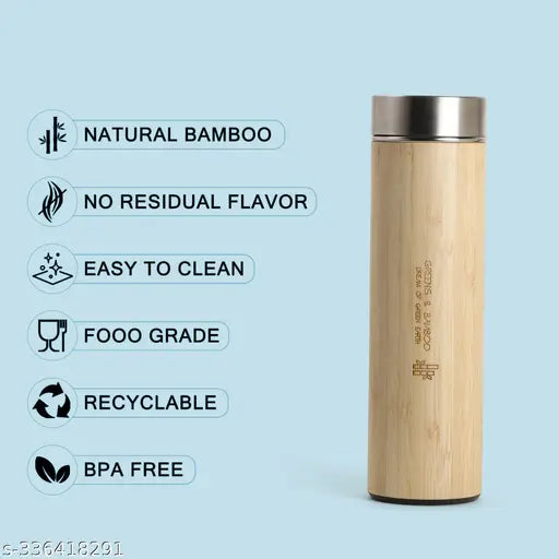 Brown stainless steel Greens and Bamboo vacuum insulated bottle, double-walled for hot and cold liquids (450ml) on table