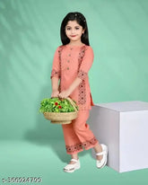 Green cotton kurti and pyjama set for girls with printed design, suitable for 2-11 years