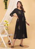 Black rayon three-quarter sleeve printed anarkali gown, comfy latest women's fashion on mannequin. Sizes: M (38in bust), L (40in bust), XL (42in bust), XXL (44in bust). Indian block print design