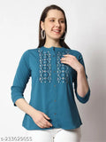 Green embroidered polyester top with three-quarter sleeves, unique pattern and design from India