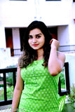 Green rayon sleeveless kurta palazzo set, printed net design, Vikanshi International, India
