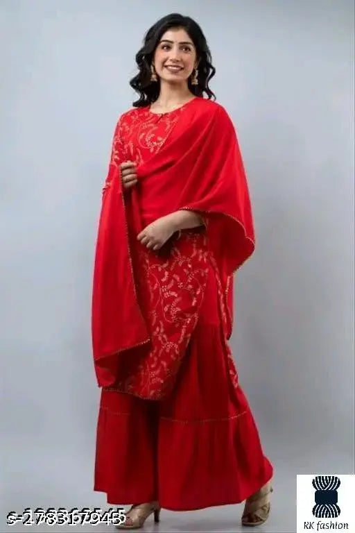 Red rayon designer kurti with gharara, embroidered net pattern. Rayon fabric, three-quarter sleeves. Sizes S to XXXL for women/girls. Made in India