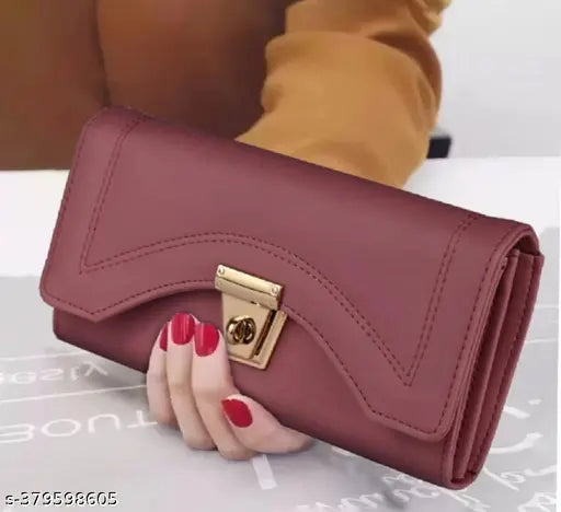 Solid faux leather wallet, 5 compartments & magnetic closure, ideal for women's essentials. Indian-made synthetic leather wallet