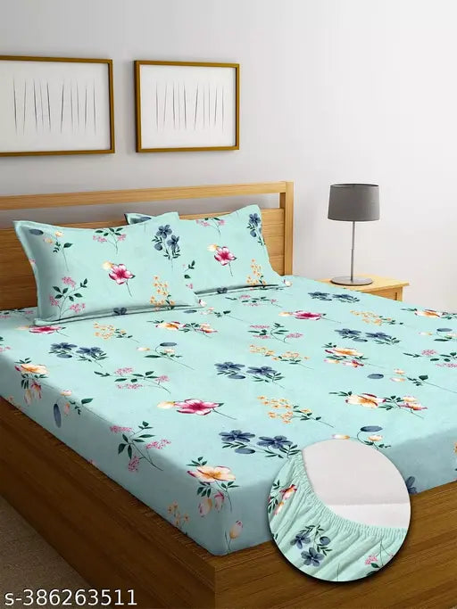 Light Green, super soft 210 TC cotton fitted bedsheets with 2 pillow covers for double bed, all around elastic. Ideal for summer, adults, and features a floral print. Made by DWORTH in India