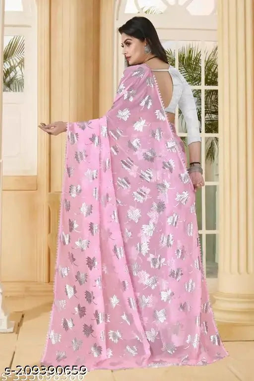 Foil print leaf saree in Georgette fabric, solid net blouse in Art Silk. Indian party wear, latest trending new sarees for festivals and weddings in 2023. Saree length: 5.5m, blouse length: 0.8m. Free size available