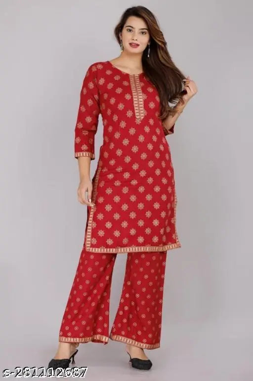 Rayon printed kurti with plazo set, three-quarter sleeves rayon fabric for women's fashion, vibrant printed Indian kurta and palazzos on display